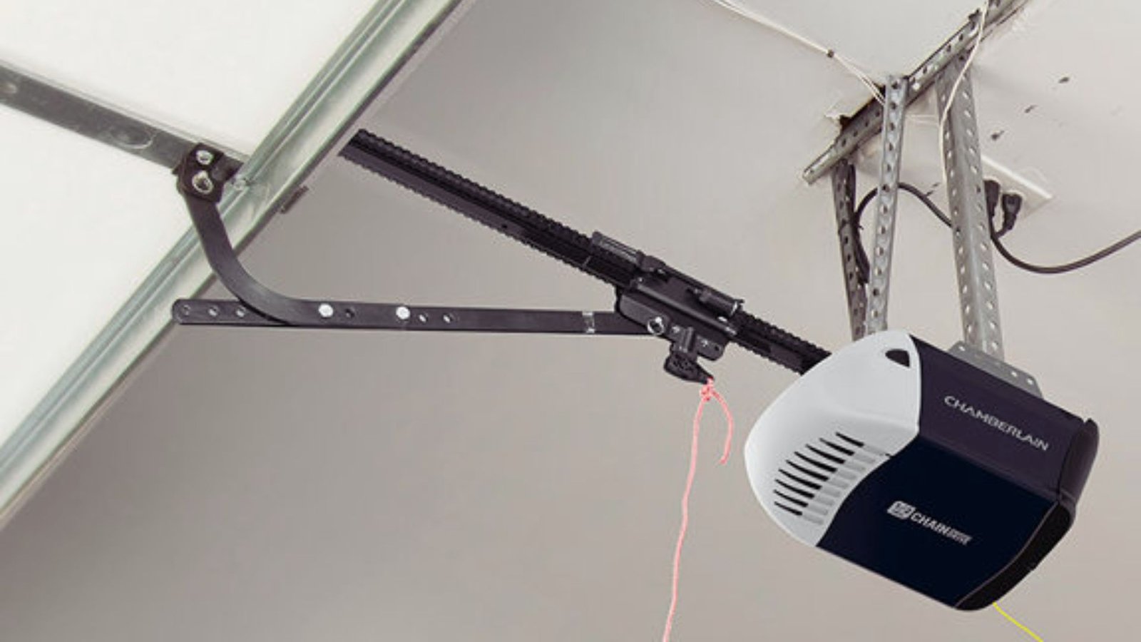 A garage door opener is securely mounted on a wall, ready for use.
